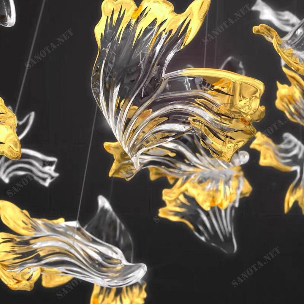 một chùm thả decor với thiết kế sang trọng và hiện đại, vẻ đẹp độc đáo trong thiết kế khi những chiếc lá thuỷ tinh được thả tự do giữa không gian nội thất, món đồ decor sẽ lung linh khi được đặt cùng với những bóng đèn, một món đồ decor độc đáo và sang trọng sẽ tạo điểm nhấn cho không gian nội thất nhà bạn