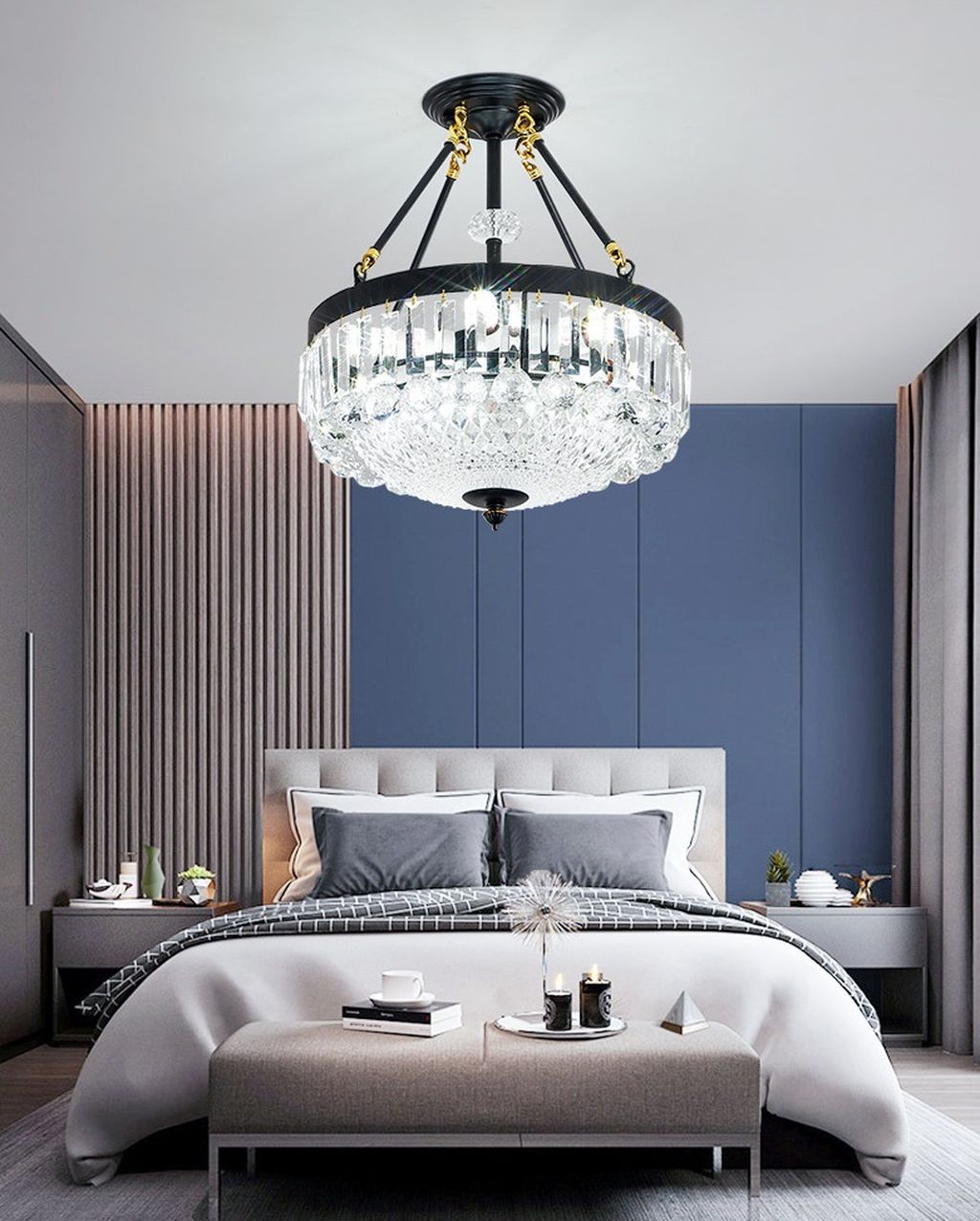 Chiếc đèn chùm pha lê cao cấp sở hữu thiết kế hình tròn cân đối, được treo từ trần nhà bằng hệ thống dây đỡ chắc chắn với các chi tiết kim loại đen nhám điểm xuyết móc nối ánh kim sang trọng. Toàn bộ phần thân đèn là sự kết hợp của pha lê cao cấp cắt gọt tỉ mỉ, tạo nên hiệu ứng phản chiếu ánh sáng lung linh và huyền ảo. Đây là mẫu đèn chùm hiện đại sang trọng phù hợp cho các không gian phòng ngủ, phòng khách, căn hộ cao cấp hay khách sạn boutique.