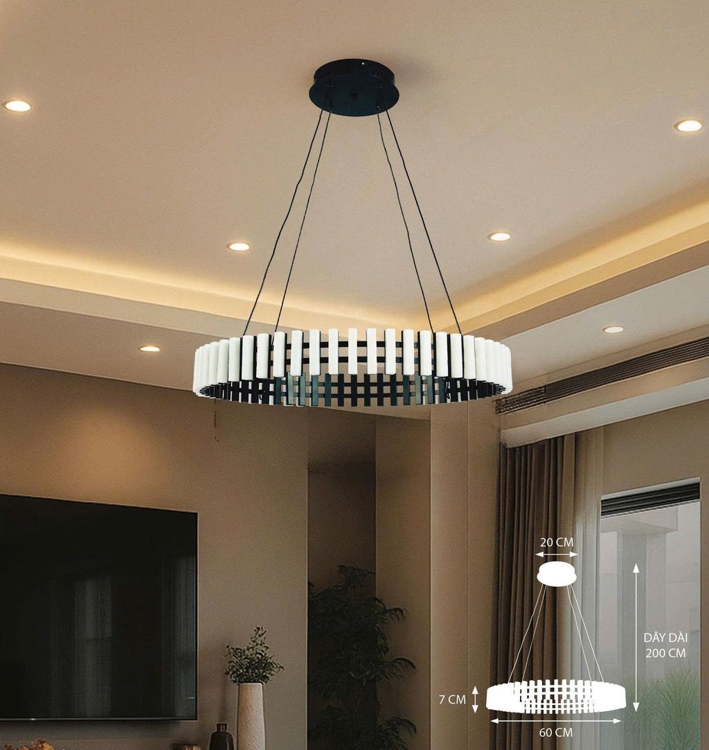 Chiếc đèn chùm vòng LED này gây ấn tượng mạnh bởi kiểu dáng hình tròn độc đáo, mang đến sự cân đối và hài hòa cho tổng thể nội thất. Thân đèn được tạo thành từ những thanh LED bố trí đều nhau, phát sáng nhẹ nhàng nhưng không kém phần nổi bật, tạo nên một vòng sáng lơ lửng đầy mê hoặc giữa không trung. Tông màu ánh sáng vàng trung tính giúp không gian phòng khách trở nên ấm cúng, sang trọng mà không gây chói mắt.