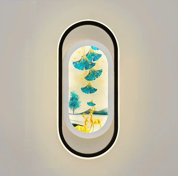 Đèn tường trang trí gây ấn tượng ngay từ ánh nhìn đầu tiên với thiết kế khung oval bo tròn mềm mại. Bao bọc bên trong là bức tranh nghệ thuật đầy ý nghĩa với hình ảnh chú hươu và cây cối. Biểu tượng cho sự thịnh vượng, bình an và phát triển. Hệ thống ánh sáng LED hiện đại được lồng ghép khéo léo, tạo hiệu ứng chiếu sáng dịu nhẹ. Vừa mang đến cảm giác ấm áp vừa tôn lên vẻ đẹp của bức tranh bên trong.