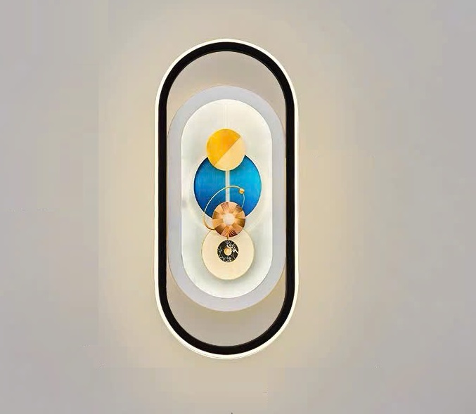 Đèn tranh treo tường được thiết kế với khung oval bo viền tinh tế. Bên trong là hình ảnh cách điệu các hành tinh với gam màu nổi bật: vàng, xanh dương, nâu đồng và trắng. Sự sắp xếp cân đối tạo cảm giác như một bức tranh vũ trụ thu nhỏ. Gợi nên chiều sâu và sự bí ẩn đầy cuốn hút. Khi ánh sáng LED lan tỏa dịu nhẹ, từng chi tiết nghệ thuật càng trở nên sống động. Mang đến hiệu ứng thị giác ấn tượng cho không gian.